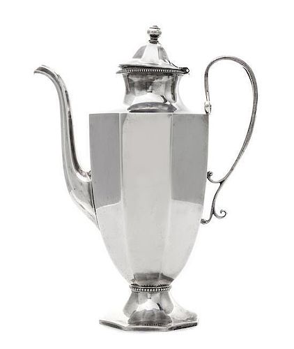 * An American Silver Demitasse Coffee Pot, Gorham Mfg. Co., Providence, RI, 1897, of panelled urn form, with beaded rims and an