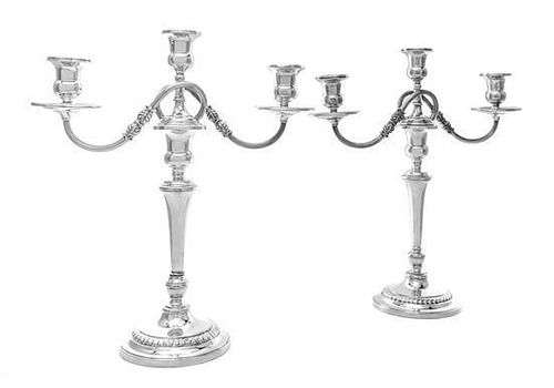 * A Pair of American Silver Three-Light Candelabra, Fisher Silversmiths, Jersey City, NJ, Mid 20th Century, on stepped circular