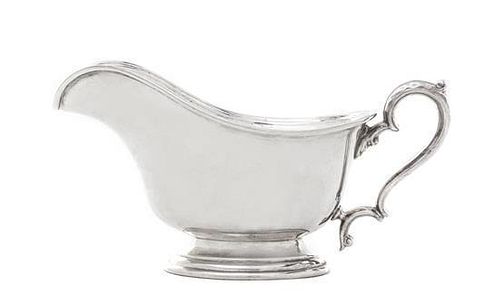 * An American Silver Sauce Boat, International Silver Co., Meriden, CT, First Half 20th Century, oval form with leaf capped doub