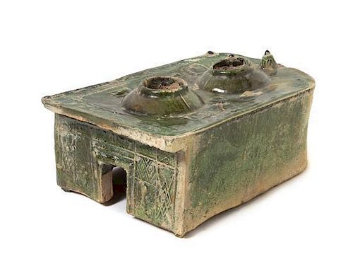 * A Chinese Dark Green Glazed Pottery Model of a Stove Length 9 x width 6 3/4 inches. 深綠釉陶爐，汉，長9 x寬6.75英吋