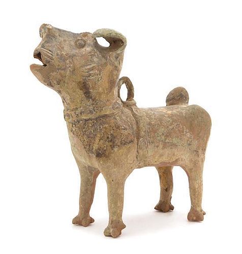 * A Chinese Green Glazed Pottery Figure of a Dog Height 13 1/4 inches. 綠釉陶狗塑像，汉，高13.25英吋