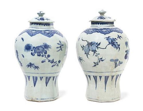 A Matched Pair of 'Hatcher Cargo' Blue and White Porcelain Covered Jars Height 13 3/4 inches. 中國外銷瓷青花花卉紋帶蓋梅瓶一對，明