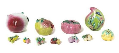 Eleven Porcelain Models of Fruit Length of largest 6 1/2 x width 5 1/4 x height 4 3/8 inches. 仿生瓷水果擺件十一件，最大长6.5x寬5.25x