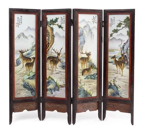 A Polychrome Enameled Porcelain Inset Four-Fold Table Screen Height of each panel 18 1/4 inches x width 4 1/2 inches. 粉彩山水梅花鹿圖桌屏