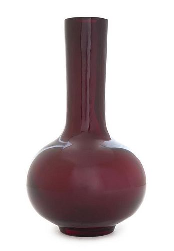 * An Opaque Red Peking Glass Vase Height 9 3/4 inches. 紅料長頸瓶，高9.75英吋