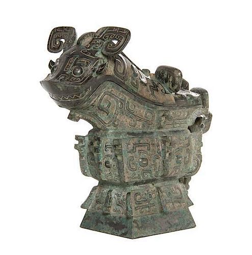 * A Bronze Ritual Gong Vessel Height 12 5/8 inches.