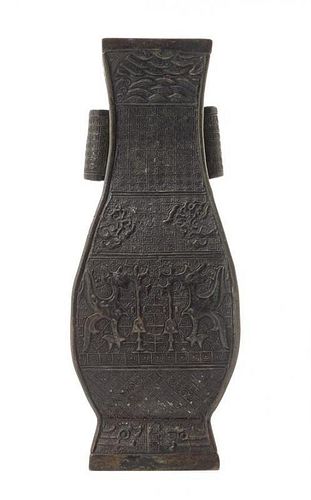* An Archaistic Bronze Vase Height 8 3/4 inches. 雙貫耳銅方瓶，高8.75英吋