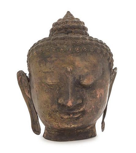 * A Bronze Head of Buddha Height 9 1/2 inches. 铜佛头，高9.5英吋