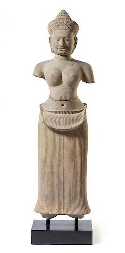 * A Khmer Sandstone Figure of Lakshmie Height 48 inches.