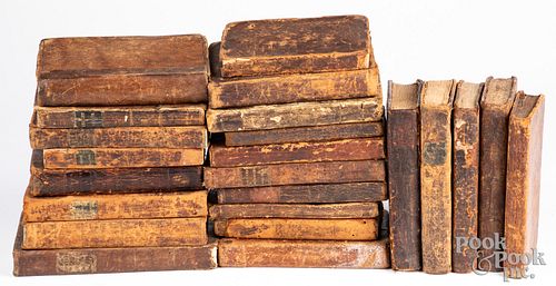 Group of twenty-three leatherbound school books