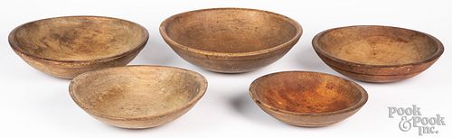 Five turned wooded bowls, 19th c.