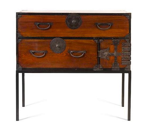 An Iron Mounted and Lacquered Tansu Chest on Stand Height 40 x width 42 x depth 17 inches.