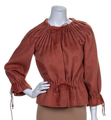 * A Carolina Herrera Rust Wool Jacket, Size 8.