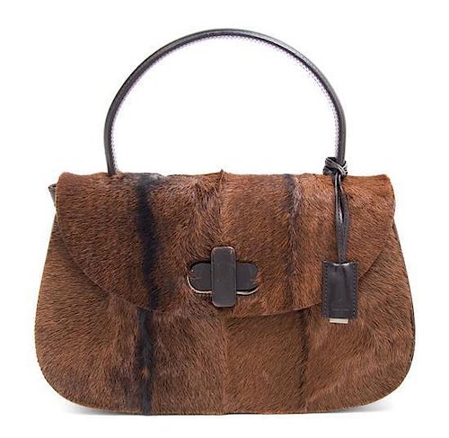 A Gucci Calf Skin and Leather Handbag, 11" x 7" x 2.5".