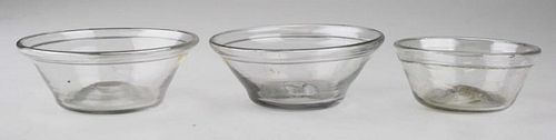 19th c pr of free blown glass dishes & another free blown dish, all w/ folded rims, clear glass, open pontils, dias 3 3/4”, 3