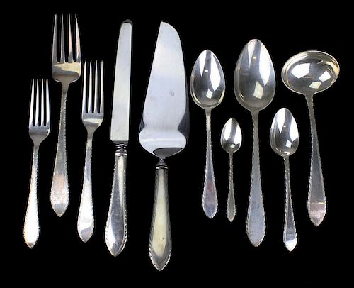 Tiffany & Co "Feather Edge" sterling flatware set. Pattern 1901. Service for 8 with serving pieces and demitasse spoons. Approx. 88.8 troy oz. 60pcs.