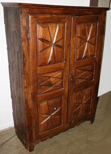 18th c French armoire, two doors having three carved panels on each door, walnut and pine. 49"w x 75"h x 19"d.
