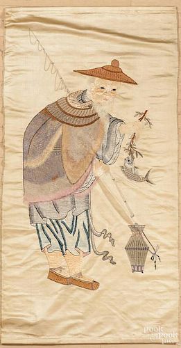 Japanese silk embroidery of a fish monger, ca. 1900, 57'' x 29''.
