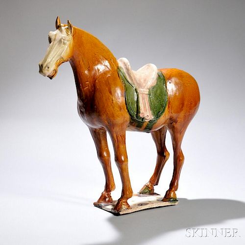 Sancai-glazed Caparisoned Horse 有马鞍的三彩马，高18.875英寸，中国唐代
