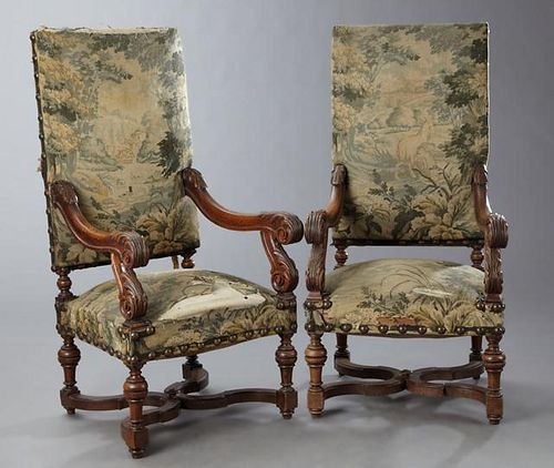 Pair of French Louis XIII Style Carved Oak Fauteui