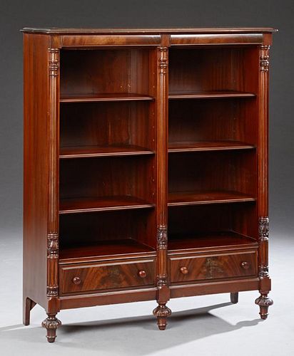 Carved Mahogany Open Bookcase, 20th c., the rectan