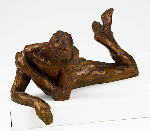 Victor Salmones (1937-1989) signed bronze of man in repose, length 8ﾔ