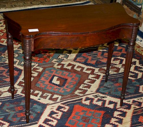 Sheraton Boston mahogany card table with serpentine front reeded leg. 38"w x 30"h.