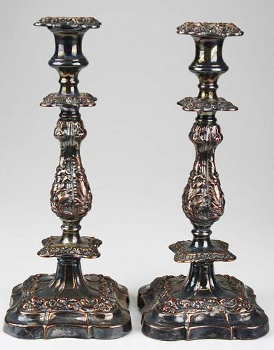 pair of old Sheffield silver plate candlesticks with deep floral repousse decoration 13" x 5.5"