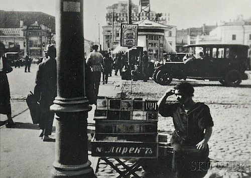 Alexander Rodchenko (Russian, 1891-1956)      The Cigarette Seller, Pushkin Square, Moscow