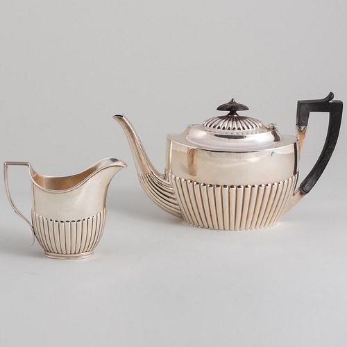 Victorian Silver Teapot and a Cream Jug