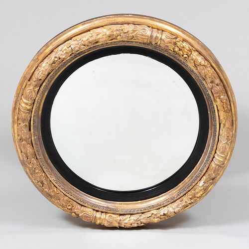 Regency Giltwood and Ebonized Convex Mirror 