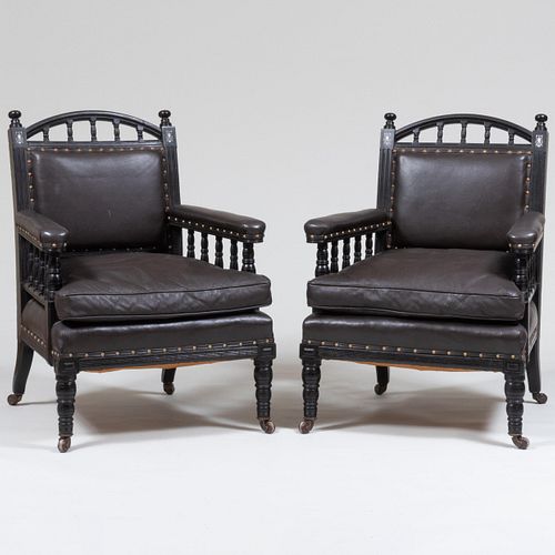 Pair of Late Victorian Ebonized And Leather Upholstered Armchairs