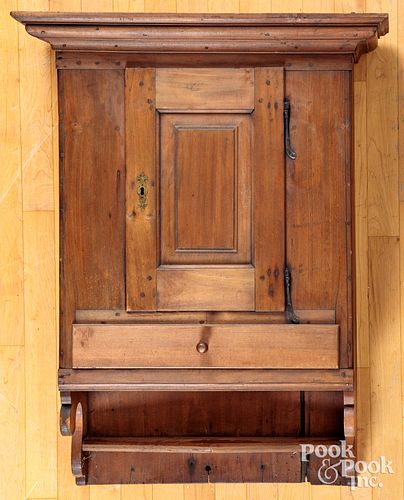 Pennsylvania poplar hanging cupboard, ca. 1800