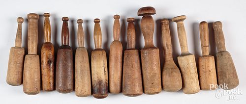 Thirteen wooden pestles and mashers, 19th c., larg