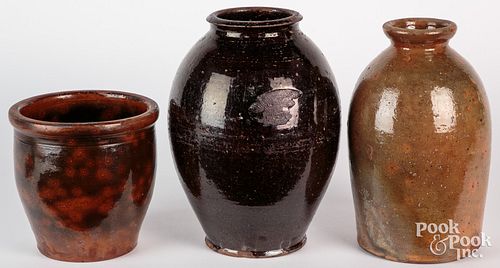 Three redware crock and jars, 19th c., to include