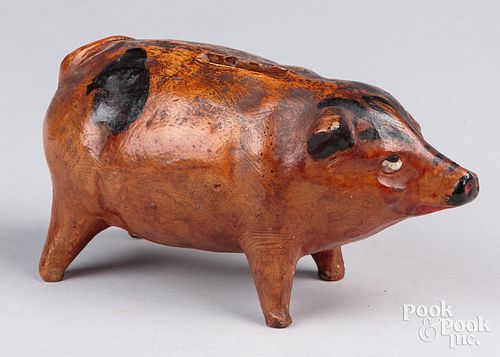 Unusual redware figural pig bank, 19th c., with pa