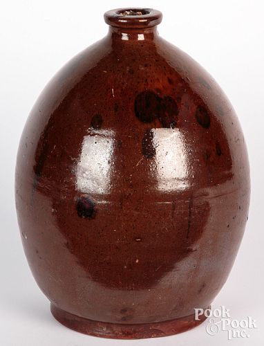 New England redware jug, 19th c., with manganese s
