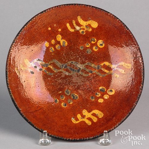Pennsylvania redware plate, 19th c., with slip dec
