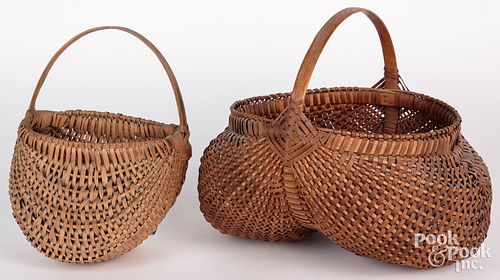 Two splint baskets, 19th c., to include a buttocks