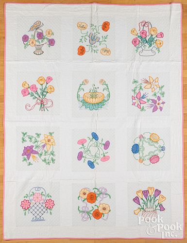 Embroidered floral quilt, mid 20th c., 62" x 82".