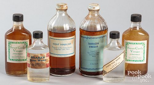 Six Sabbathday Lake Shaker glass bottles, 20th c.,