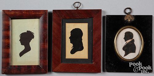 Three silhouettes, 19th c., one hollowcut of a wom