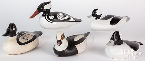 Five carved and painted duck decoys, 20th c., one