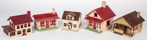 Five painted toy house models, early to mid 20th c