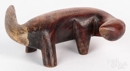 Carved stylized otter, early 20th c., likely Alask