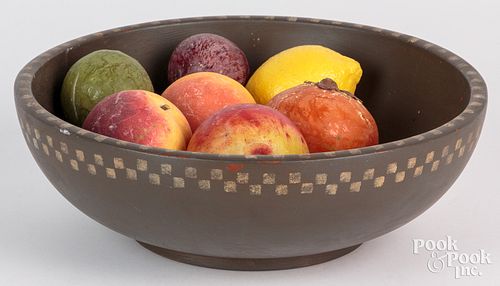 Seven pieces of stone fruit, in a contemporary tur
