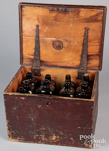 Painted pine bottle case, 19th c., with twelve gin