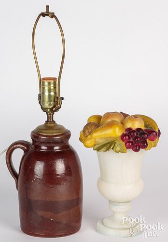 Two decorative accessories, to include a stone jar