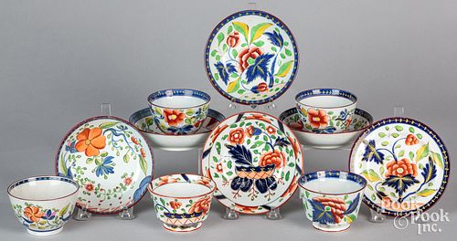 Five Gaudy Dutch porcelain cups and saucers