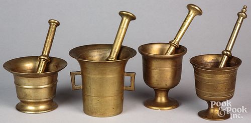 Four bell metal and brass mortar and pestles